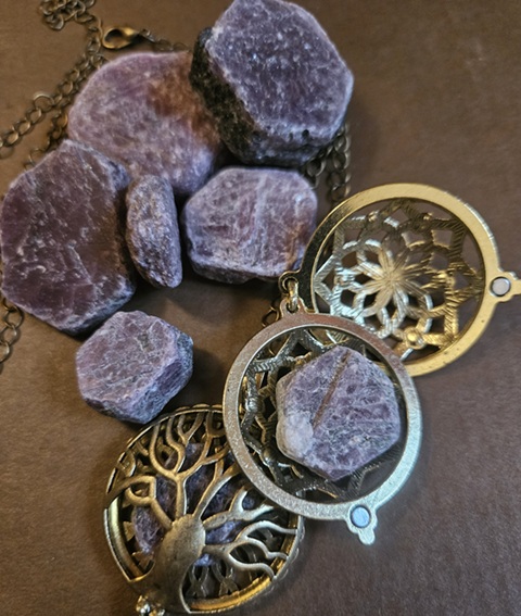 Ruby raw in locket Ruby Pendants - Image 1